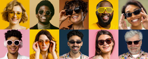 People with glasses posing in a studio.